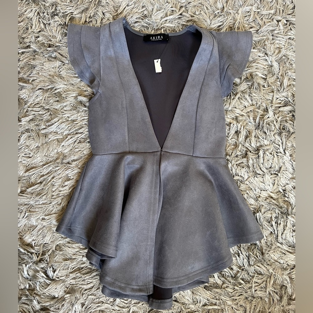 Suede peplum top.